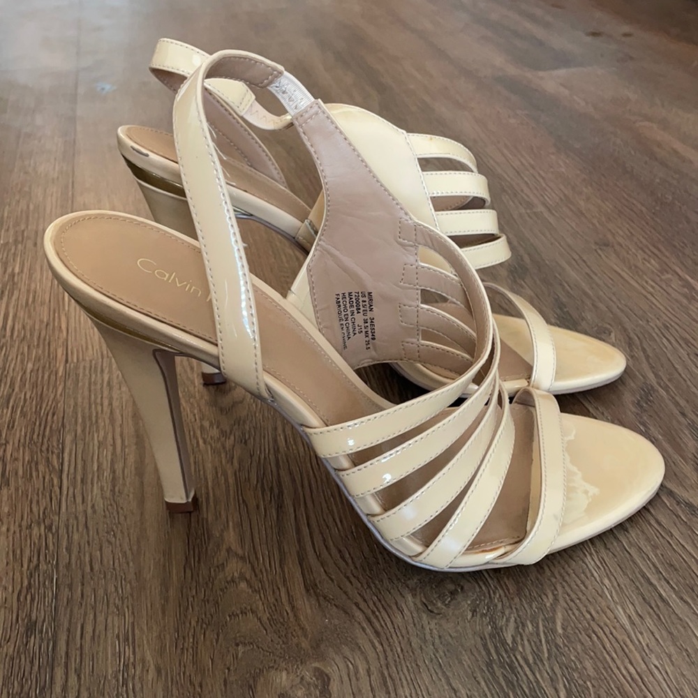 Calvin Klein heels. Lightly worn. A few marks but only worn once.
